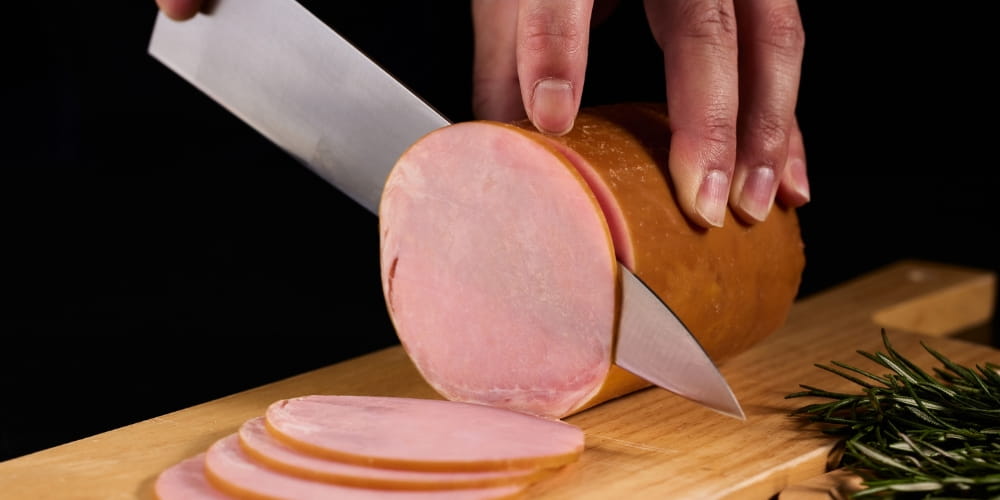 Comment découper un jambon cru entier